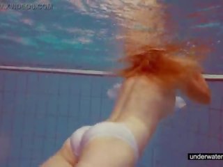 Perky Melissa plays underwater
