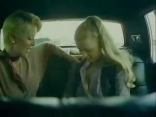 Two lustful babes doing lesbian sex video in car