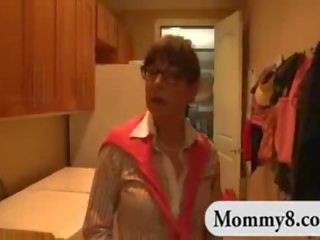 Prime stepmom catches a seductress couple having adult film in her house